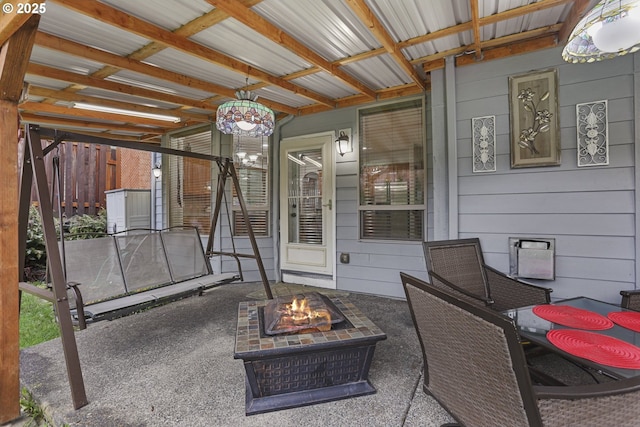 view of patio featuring an outdoor fire pit