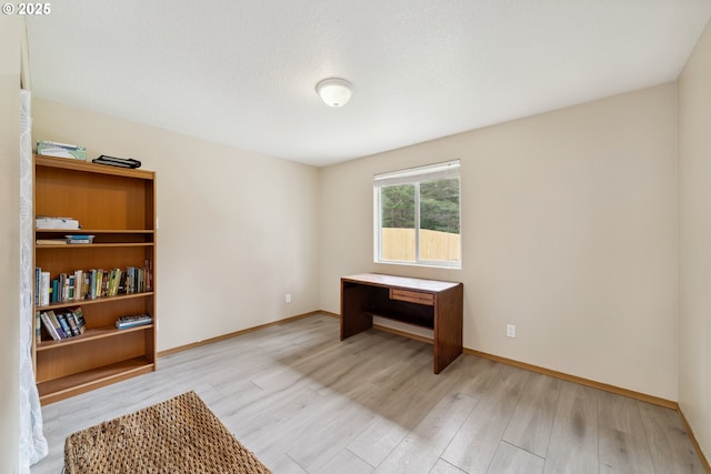 35363 Bayside Gardens Rd, Nehalem, OR 97131 - unfurnished office featuring light wood-type flooring and baseboards