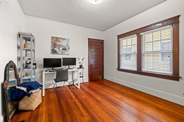 3113 SE Main St, Portland, OR 97214 - office area featuring a textured ceiling, wood finished floors, and baseboards