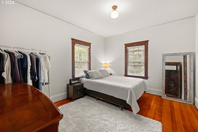 3113 SE Main St, Portland, OR 97214 - bedroom with baseboards and wood finished floors