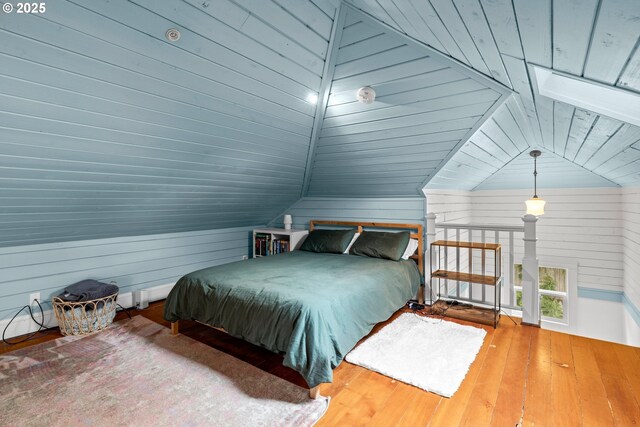 3113 SE Main St, Portland, OR 97214 - bedroom with lofted ceiling, hardwood / wood-style floors, and wooden walls