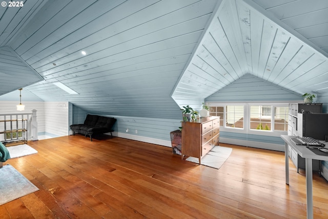 3113 SE Main St, Portland, OR 97214 - bonus room featuring lofted ceiling, wood-type flooring, wooden walls, wood ceiling, and a baseboard heating unit