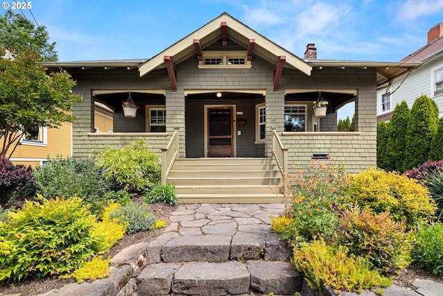 3113 SE Main St, Portland, OR 97214 - view of front of home featuring a porch and a chimney