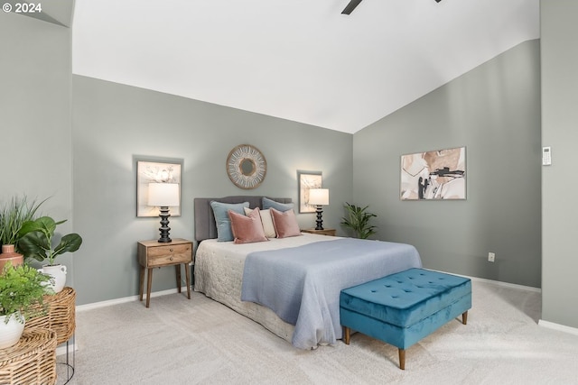 bedroom with lofted ceiling, carpet flooring, and ceiling fan