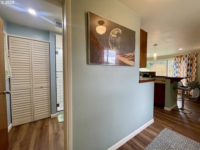54825 Robinson Rd, Coquille, OR 97423 - hallway featuring wood finished floors and baseboards