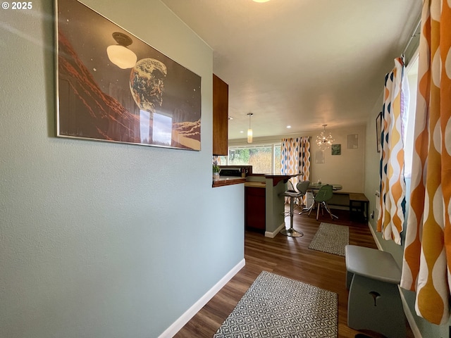54825 Robinson Rd, Coquille, OR 97423 - hall featuring dark wood-style flooring and baseboards