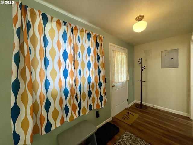 54825 Robinson Rd, Coquille, OR 97423 - mudroom featuring electric panel, baseboards, and dark wood-style flooring