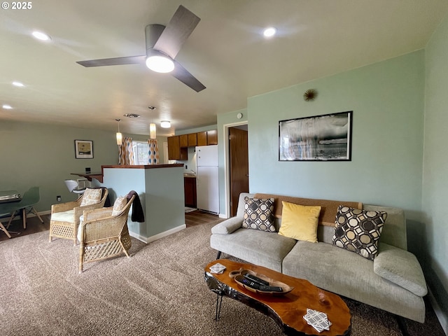 54825 Robinson Rd, Coquille, OR 97423 - carpeted living room featuring a ceiling fan, recessed lighting, and baseboards