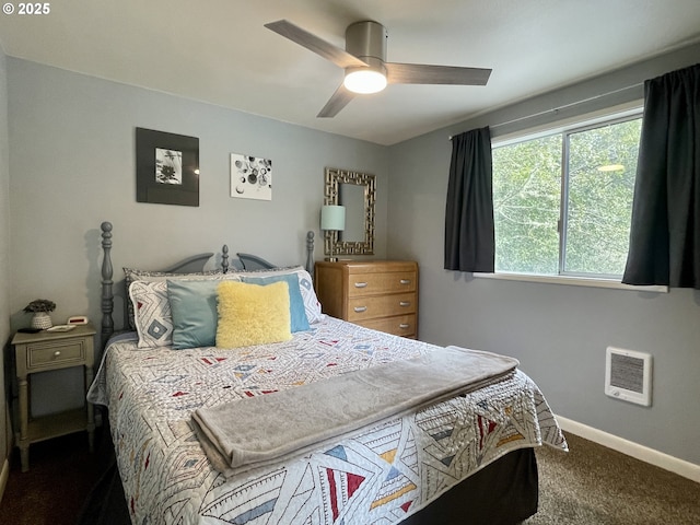 54825 Robinson Rd, Coquille, OR 97423 - bedroom with carpet floors, baseboards, heating unit, and a ceiling fan
