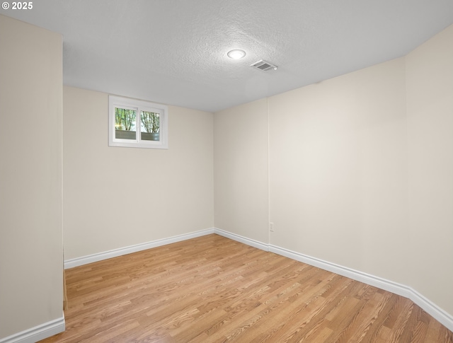 13920 Shireva Dr, Lake Oswego, OR 97034 - spare room with a textured ceiling and light wood finished floors