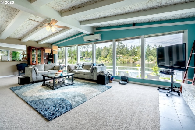 carpeted living area with plenty of natural light, a ceiling fan, a wall mounted air conditioner, and baseboards