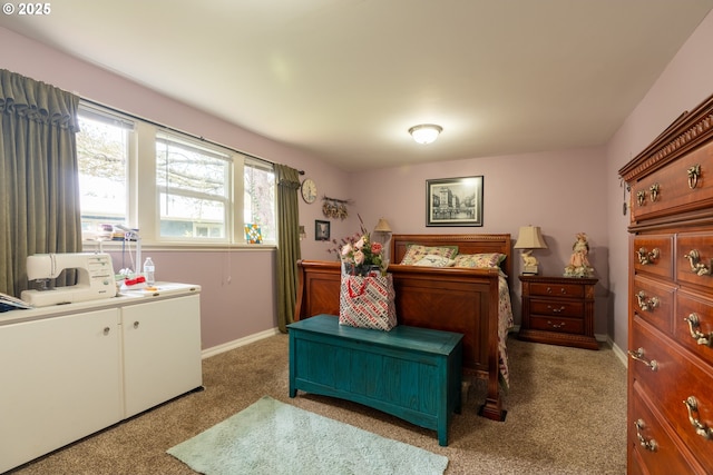 carpeted bedroom featuring baseboards