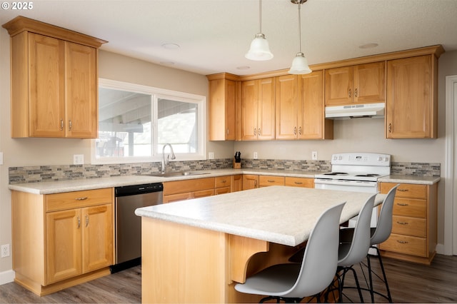 kitchen with a center island, electric stove, sink, stainless steel dishwasher, and dark hardwood / wood-style floors