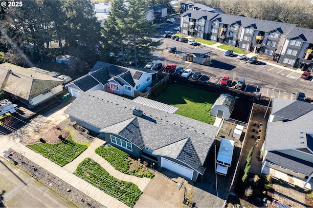 birds eye view of property featuring a residential view