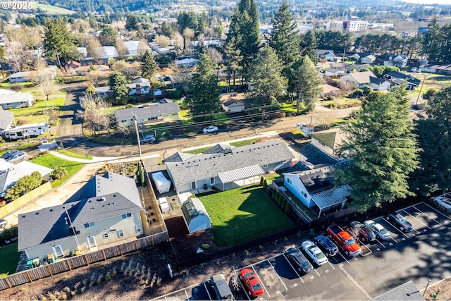 birds eye view of property with a residential view