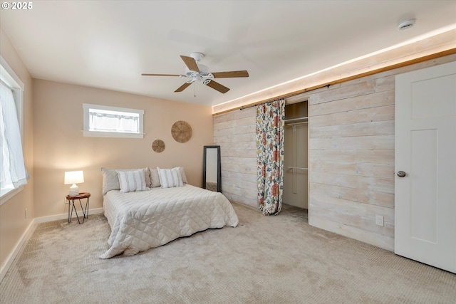 419 State St, Lyle, WA 98635 - carpeted bedroom featuring a closet, wooden walls, and ceiling fan