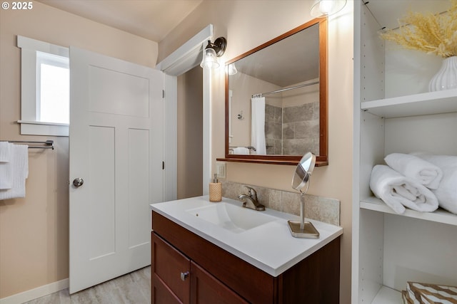 419 State St, Lyle, WA 98635 - full bathroom with a shower with shower curtain, wood finished floors, and vanity