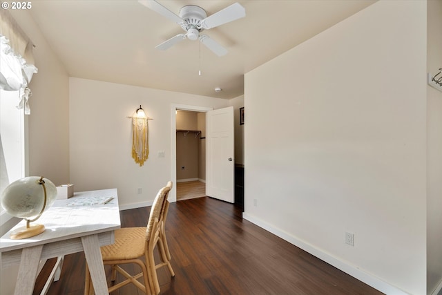 419 State St, Lyle, WA 98635 - dining room featuring dark wood-type flooring, ceiling fan, and baseboards