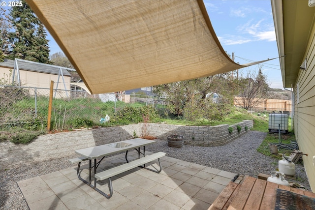 419 State St, Lyle, WA 98635 - view of patio featuring a fenced backyard and outdoor dining space