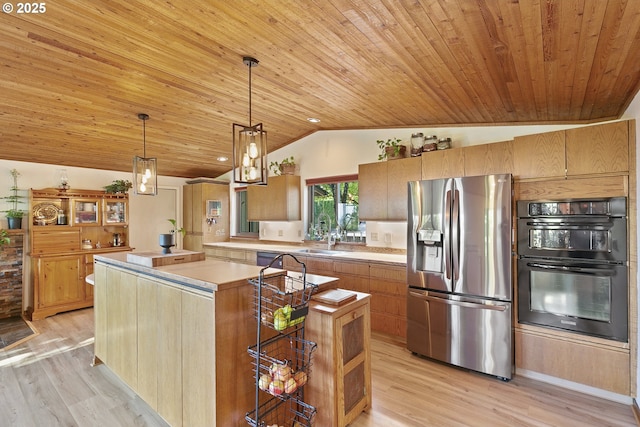 kitchen with stainless steel fridge, a sink, light wood finished floors, wooden ceiling, and vaulted ceiling