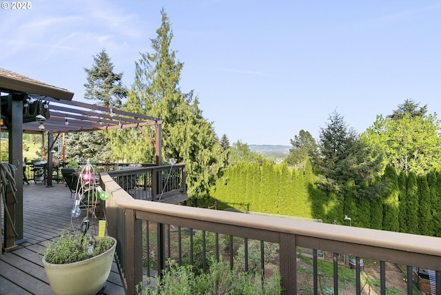 balcony featuring a pergola
