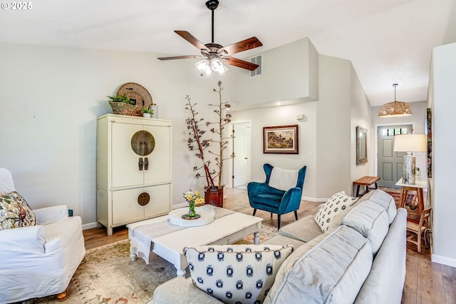 603 Lone Oaks Loop, Silverton, OR 97381 - living area featuring light wood-style flooring, a ceiling fan, and high vaulted ceiling
