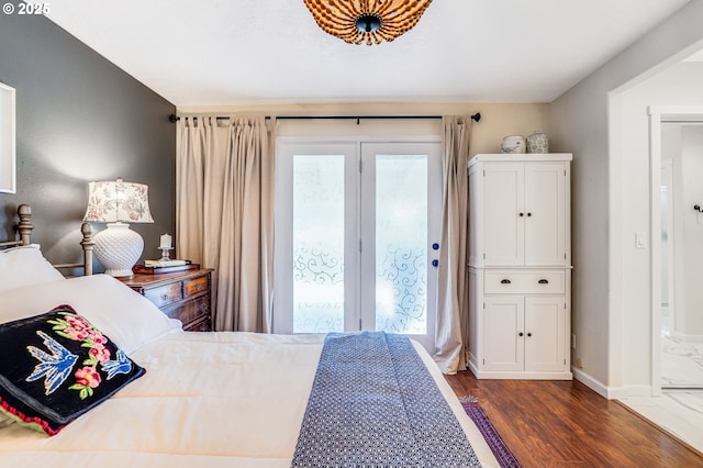 603 Lone Oaks Loop, Silverton, OR 97381 - bedroom featuring access to outside and dark wood-style flooring