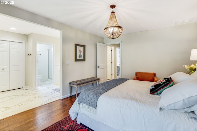 603 Lone Oaks Loop, Silverton, OR 97381 - bedroom with a chandelier, marble finish flooring, and recessed lighting