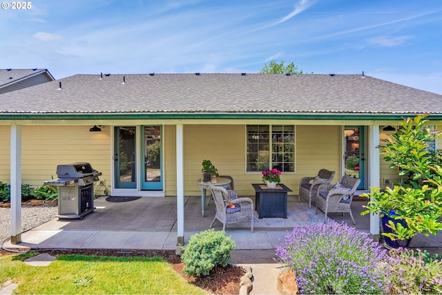 603 Lone Oaks Loop, Silverton, OR 97381 - rear view of property featuring a patio area and an outdoor hangout area