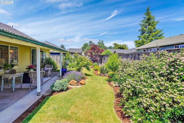 603 Lone Oaks Loop, Silverton, OR 97381 - fenced backyard with a patio area