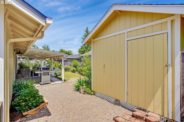 603 Lone Oaks Loop, Silverton, OR 97381 - view of patio / terrace featuring a storage unit and area for grilling