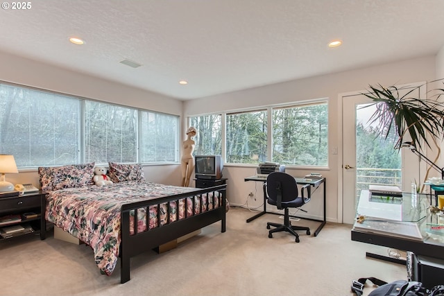 8408 NW Pinnacle Ct, Portland, OR 97229 - carpeted bedroom featuring multiple windows, recessed lighting, and access to outside