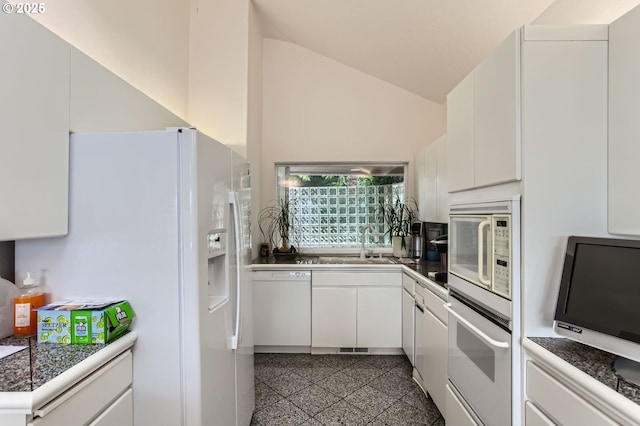 8408 NW Pinnacle Ct, Portland, OR 97229 - kitchen with white appliances, granite tiled floors, a sink, white cabinetry, and high vaulted ceiling