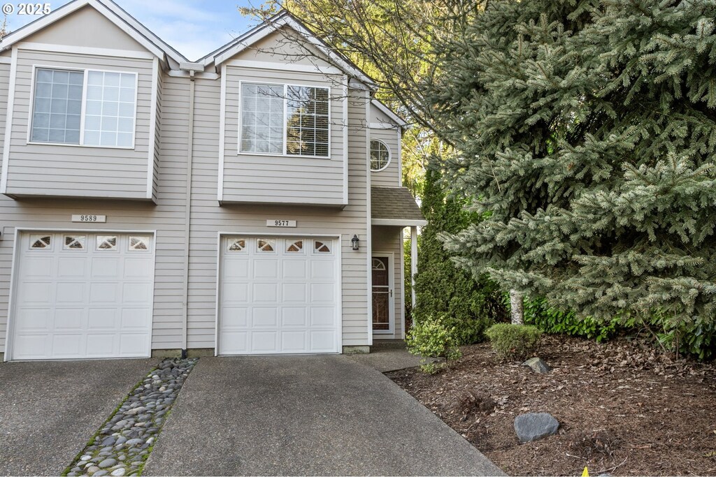 view of front of property featuring a garage