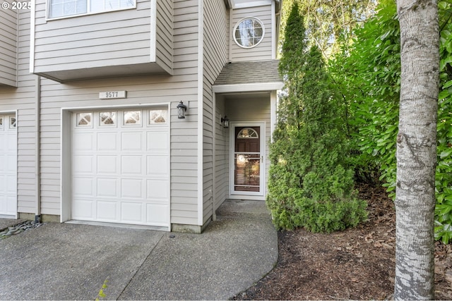 property entrance with a garage