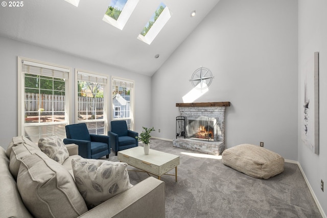 6783 Apollo Rd, West Linn, OR 97068 - living area featuring high vaulted ceiling, a warm lit fireplace, carpet, a skylight, and baseboards