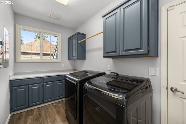 6783 Apollo Rd, West Linn, OR 97068 - laundry room featuring cabinet space, washer and dryer, and dark wood finished floors