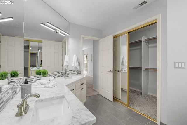 6783 Apollo Rd, West Linn, OR 97068 - full bath featuring double vanity, tile patterned floors, and a closet