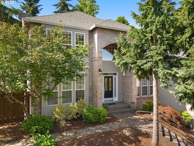 6783 Apollo Rd, West Linn, OR 97068 - traditional-style home with brick siding and roof with shingles