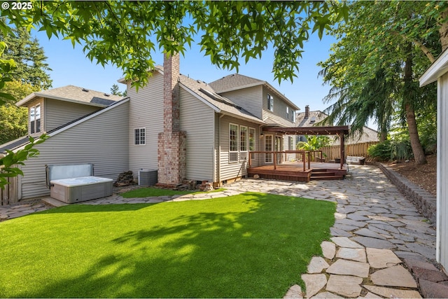 6783 Apollo Rd, West Linn, OR 97068 - rear view of property featuring a wooden deck, a chimney, central AC unit, and a shingled roof