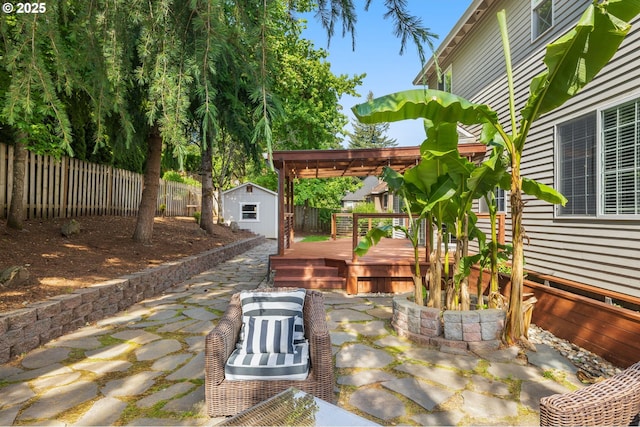 6783 Apollo Rd, West Linn, OR 97068 - fenced backyard with a wooden deck and a patio
