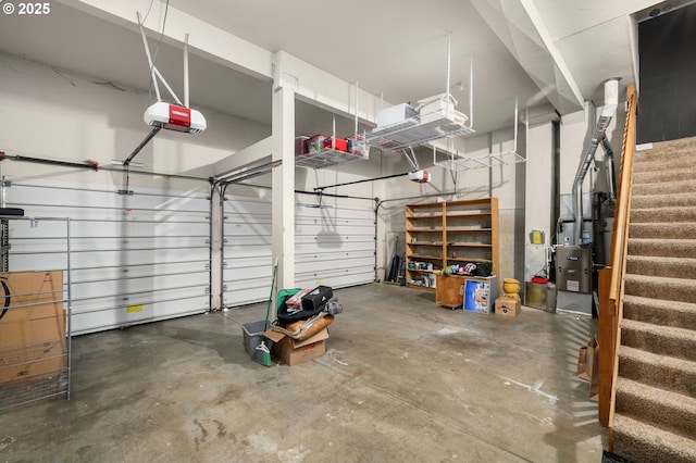 6783 Apollo Rd, West Linn, OR 97068 - garage featuring a garage door opener