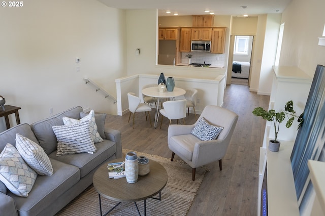 2368 Kingwood St, Forest Grove, OR 97116 - living room featuring light wood-style floors, recessed lighting, and baseboards