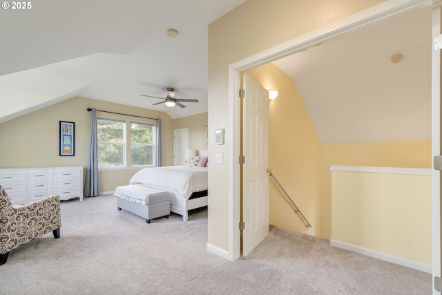 carpeted bedroom featuring ceiling fan and lofted ceiling