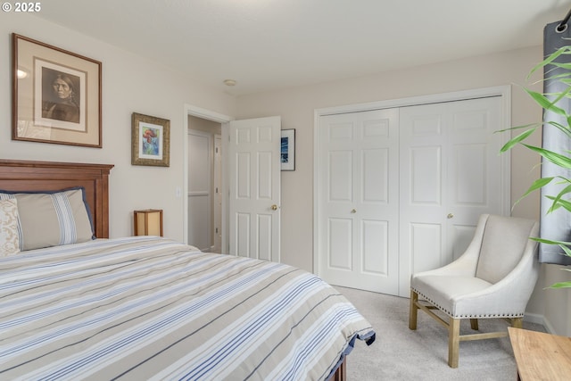 bedroom with carpet floors and a closet