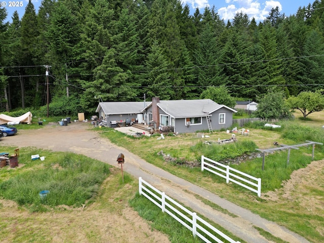 36285 Row River Rd, Cottage Grove, OR 97424 - aerial view of property and surrounding area featuring a heavily wooded area