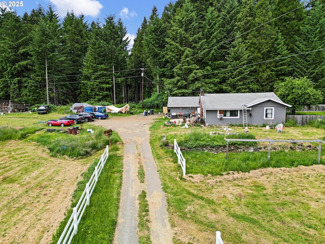 36285 Row River Rd, Cottage Grove, OR 97424 - view of yard featuring driveway and a view of trees