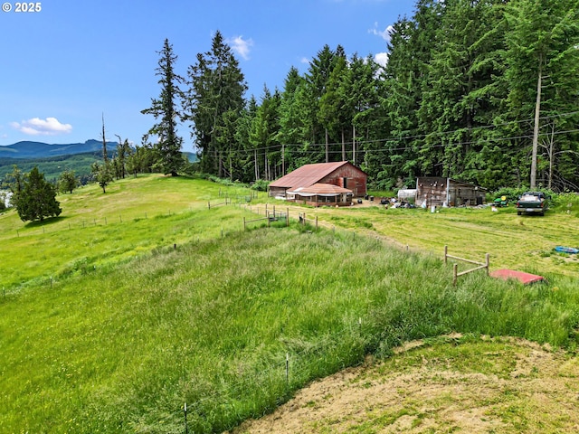 36285 Row River Rd, Cottage Grove, OR 97424 - view of yard featuring a view of rural / pastoral area, a mountain view, and an outbuilding