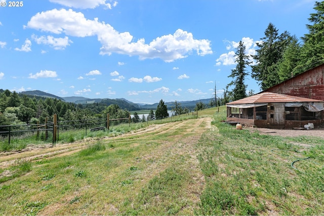 36285 Row River Rd, Cottage Grove, OR 97424 - view of yard featuring a mountain view, a rural view, and an outdoor structure