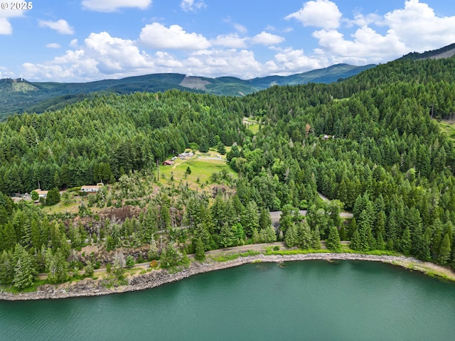 36285 Row River Rd, Cottage Grove, OR 97424 - aerial view of a heavily wooded area and a water and mountain view